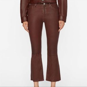 Frame Le Crop Mini Boot Cut Coated Jeans I’m the color Burgundy. Size 26